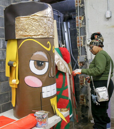 Malia Alford, of Southfield, aims to promote a message of love and kindness through her nutcracker, “King Choco,” the giant chocolate king of hearts.